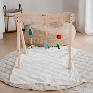 Wooden baby gym.